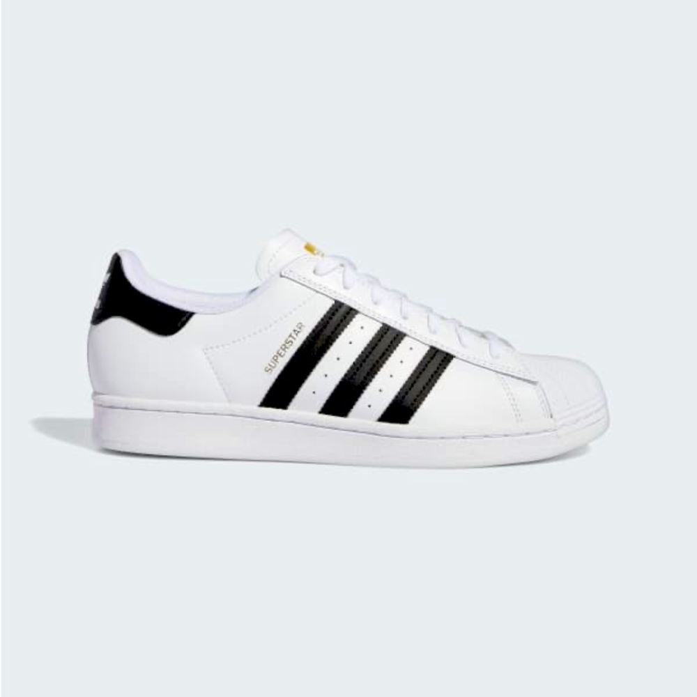 adidas superstar adv shoes. Black and white with a bit of gold.